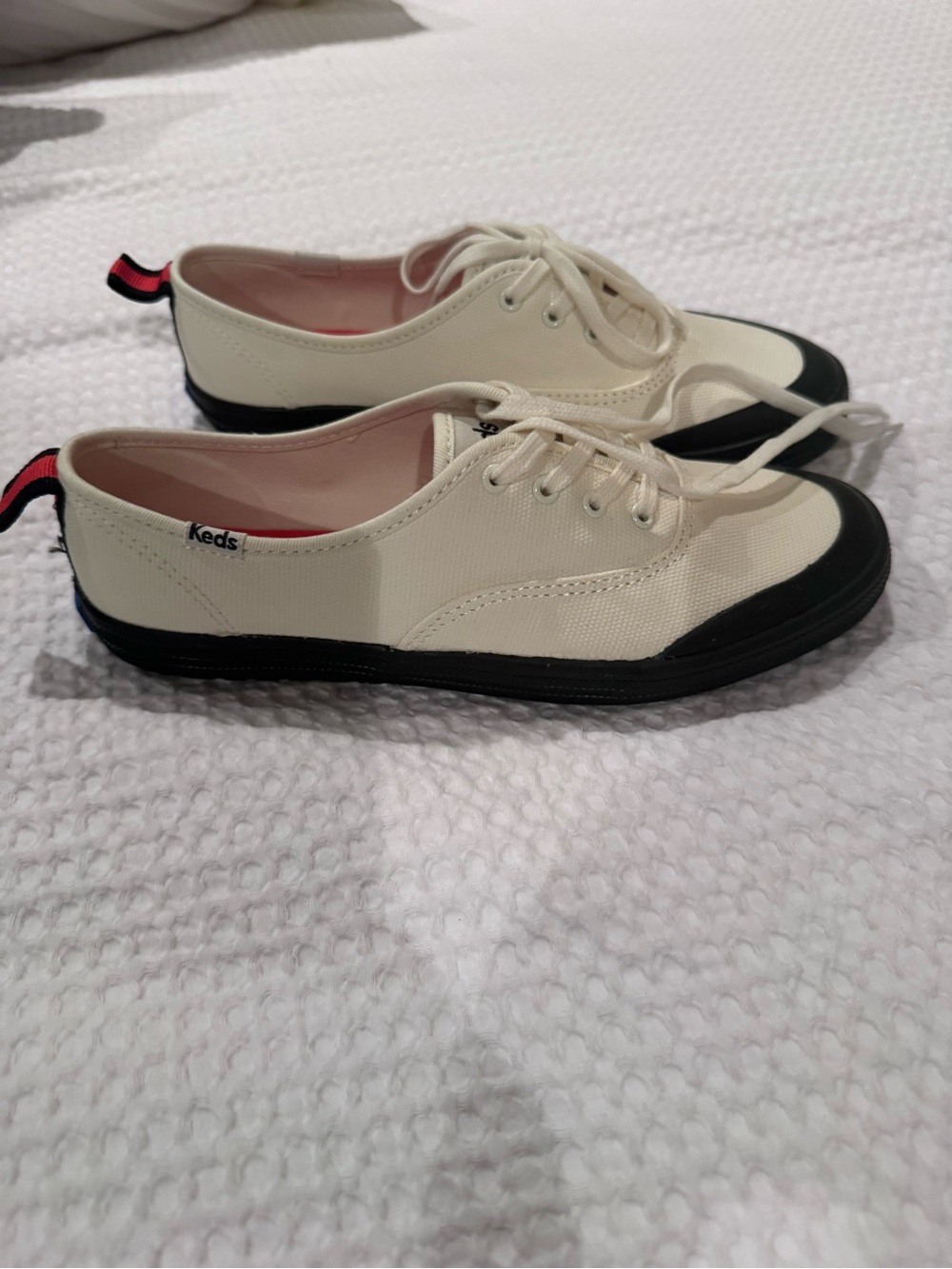 Keds Ivory Canvas Sneakers with Black Trim and Pink Heel Tab